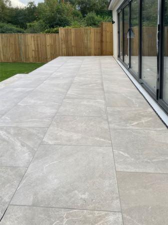 Wentworth Landscaping Grey Porcelain Patio with Sliding Doors at New Build