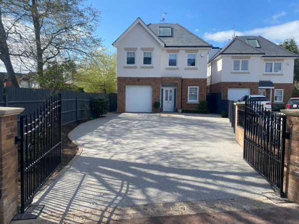 Wentworth Landscaping Resin Bound Driveway with Iron Gates and Brick Pillars