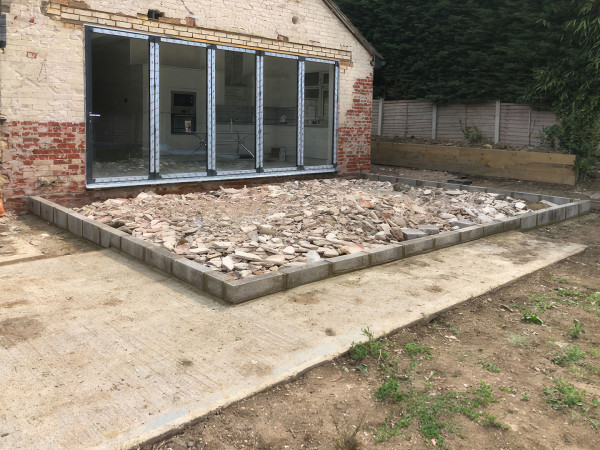 Wentworth Landscaping Turfed Garden and Patio with Railway Sleeper Edging at Period Home